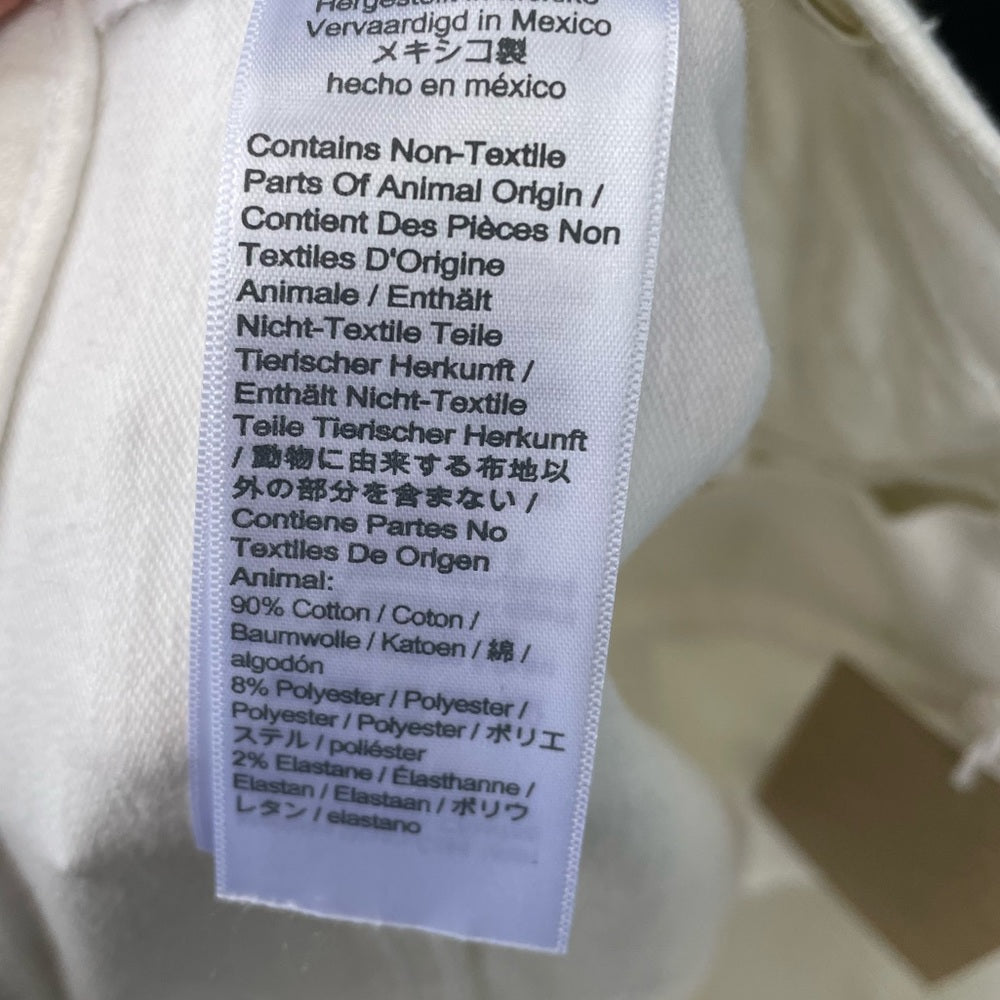 Madewell 9" Mid-Rise Skinny Crop Jeans in Pure White: Knee-Rip Edition, size 32