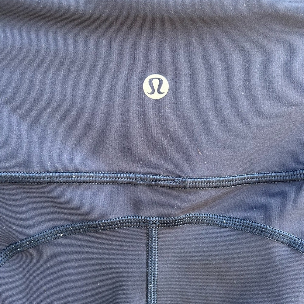 Lululemon navy all the right places crop, size 8