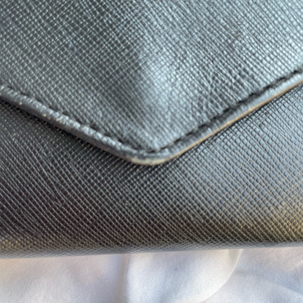 Roots black leather wallet, 7.5” x 4” x 0.5”