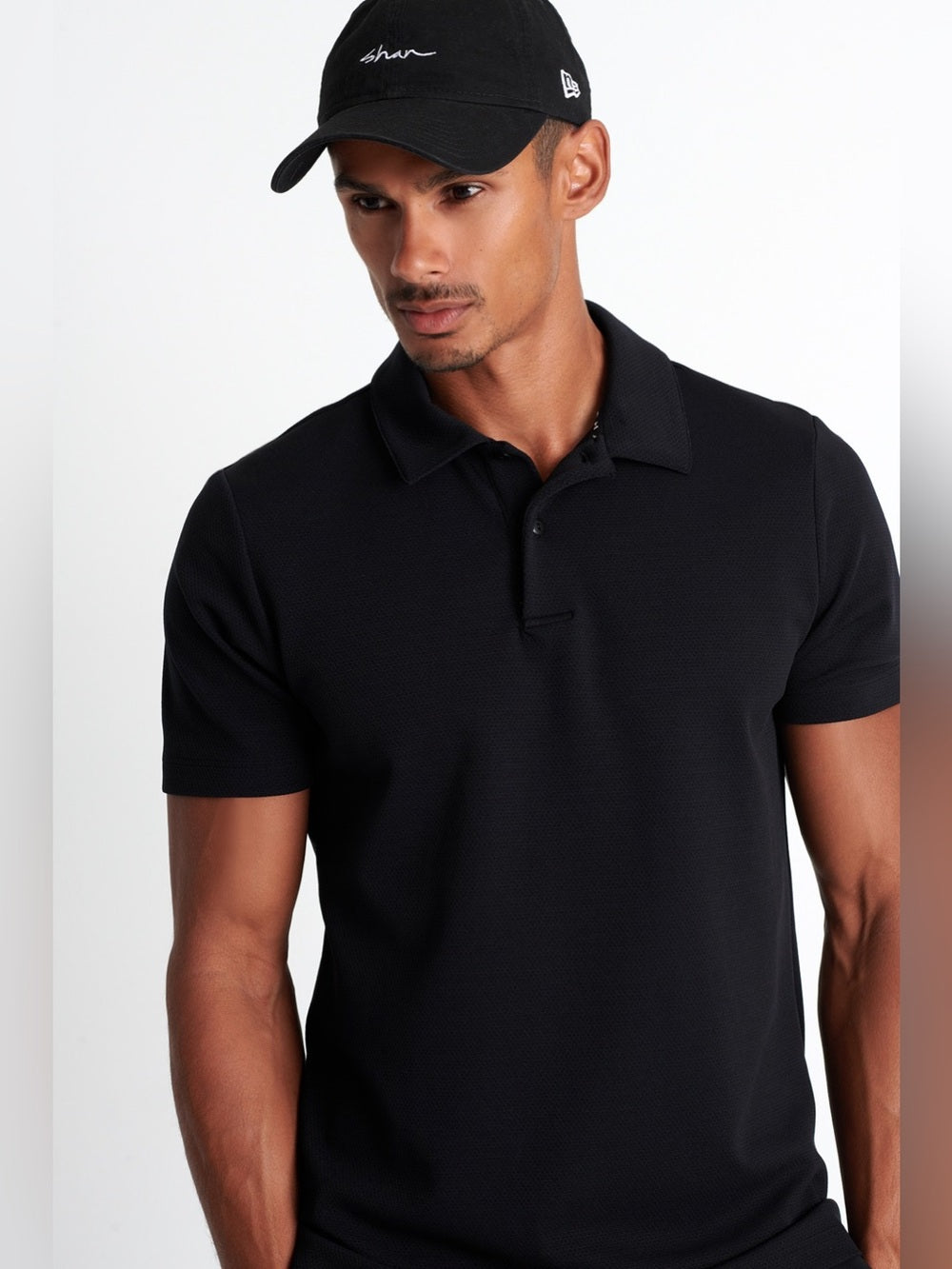 Shan Actuel Polo, black, BNWT, size L