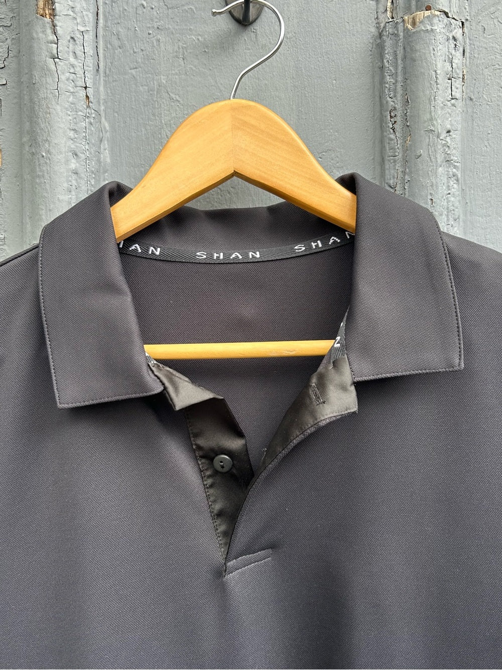 Shan Actuel Polo, black, BNWT, size L