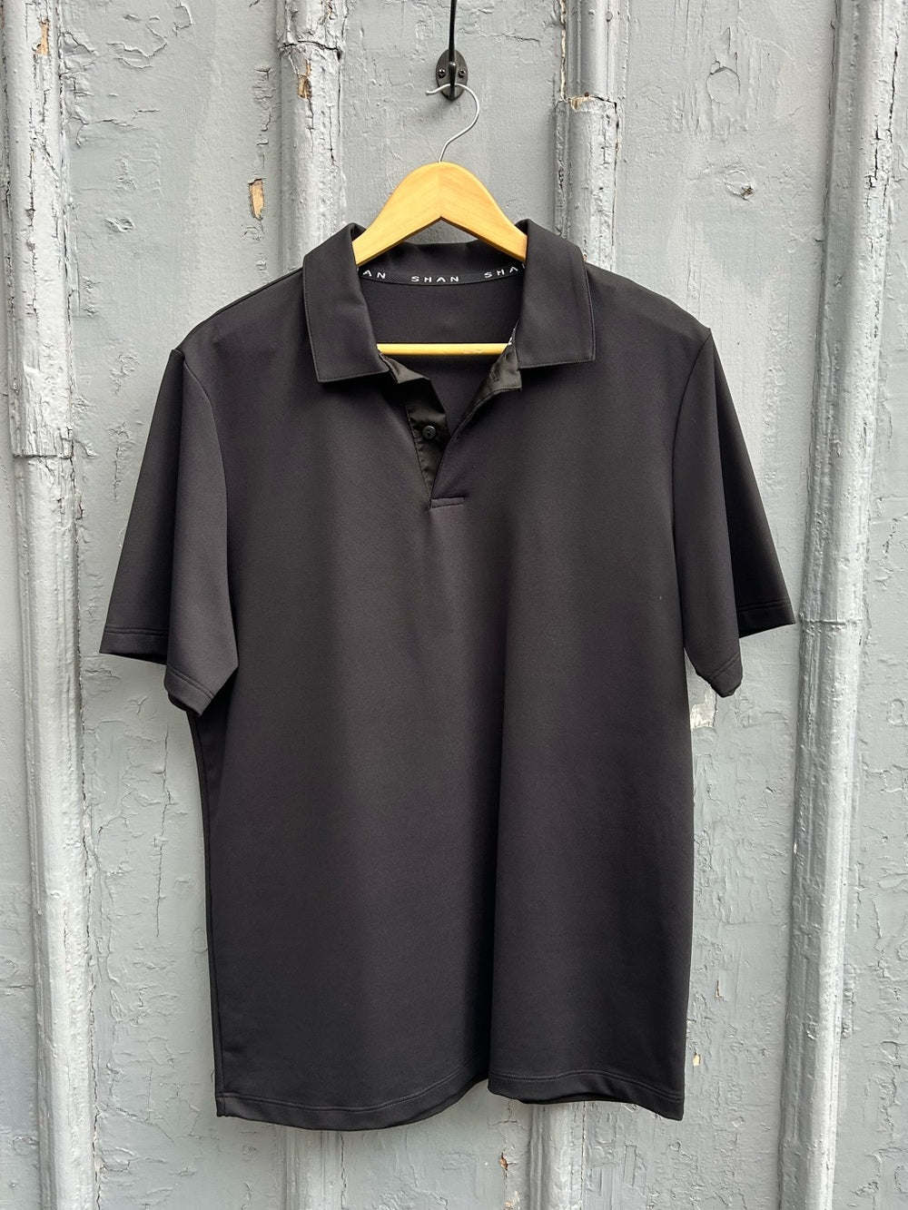 Shan Actuel Polo, black, BNWT, size L