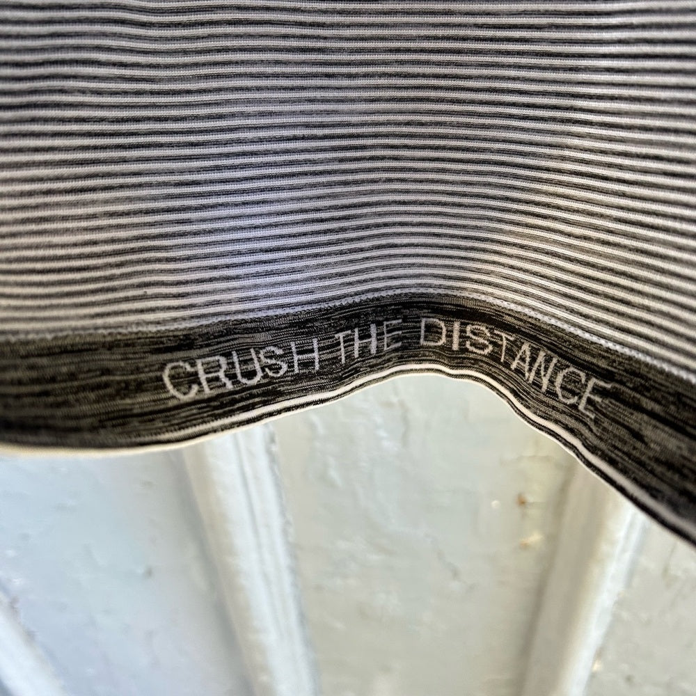 Lululemon swiftly black and white striped tank, size 2
